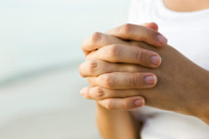 Woman's clasped hands