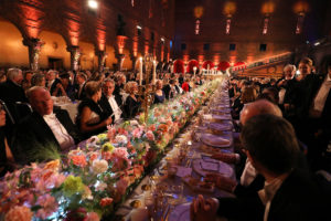 Guests attend the 2016 Nobel Banquet at the Stockholm City Hall on December 10, 2016 in Stockholm, Sweden. Nobel laureates are honoured every year on December 10 -- the anniversary of the death of prize's founder Alfred Nobel, a Swedish industrialist, inventor and philanthropist. / AFP PHOTO / SOREN ANDERSSON